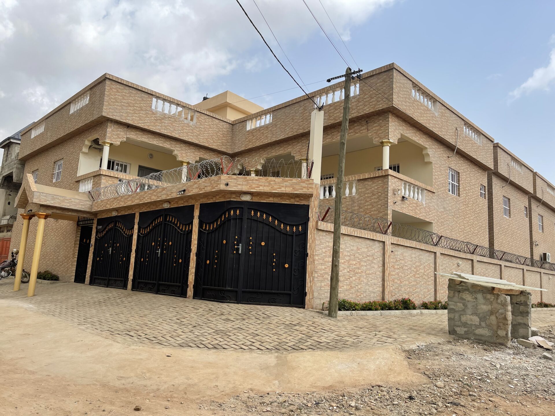 A huge residential property with brown bricks